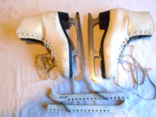 Lady's white Belati skating boots with MK Silver Ice Dance skates