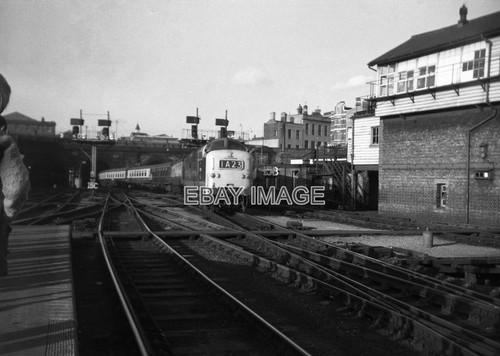 Photo kings cross station - cross,