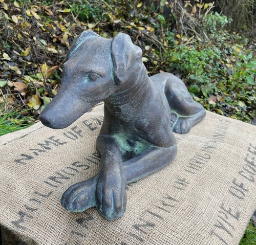Whippet dog lying down - , statue