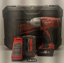 Milwaukee 1/2" Impact + Charger + X2 batteries and box.