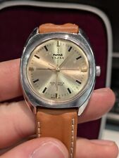 Mens HMT Vijay on a brown leather strap, sporting a golden-coloured dial