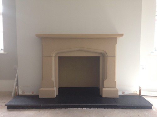 Tudor limestone fireplace