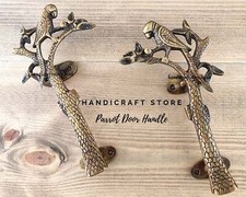 Set brass parrot - of, door