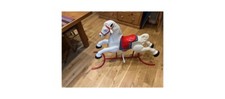 vintage pressed metal rocking horse