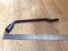 Vintage Wheel Brace With Wheel Hub Cap Remover