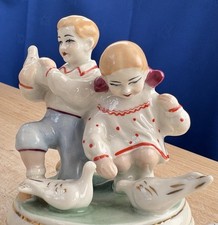 Polonne UkrainianSoviet porcelain figurine Children feeding pigeons Vintage USSR
