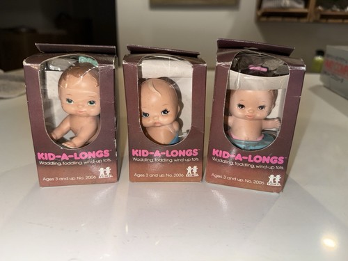 Vintage tomy kid - longs, wind