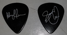 Rush - Alex Lifeson and Geddy Lee signed guitar picks, 2004 R30 Anniversary Tour