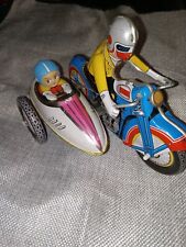 Antique tin motorcycle and