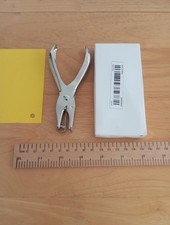 Brand New Ticket Punch Hole