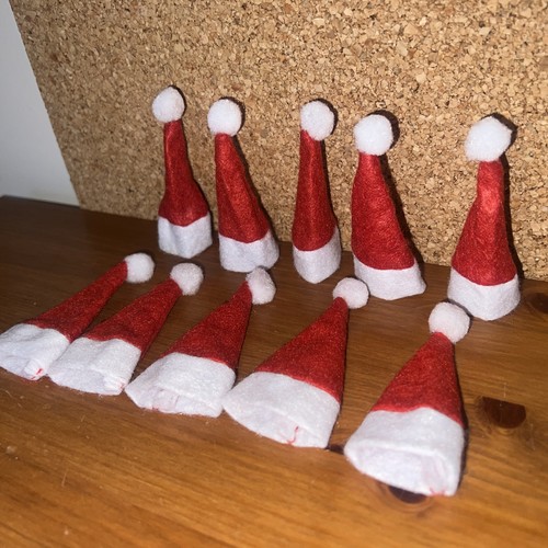 Small santa hats for - 10,