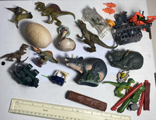NP185 Jurassic Park bundle of spares toys various bits and bobs missiles etc