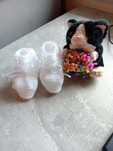 Hand knitted baby - hand,