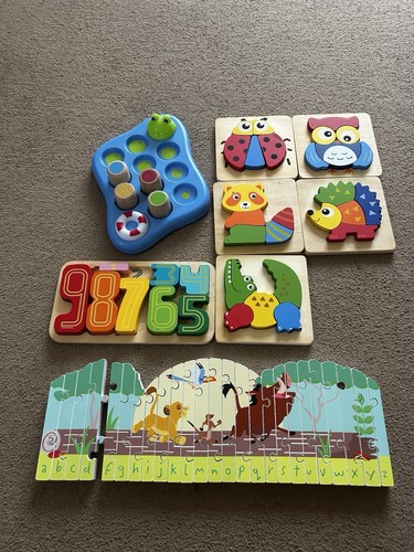Wooden puzzles including - puzzles,,