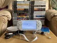 PLAYSTATION PORTABLE (PSP-2003 CERAMIC WHITE) WITH ACCESSORIES, GAMES AND MOVIES