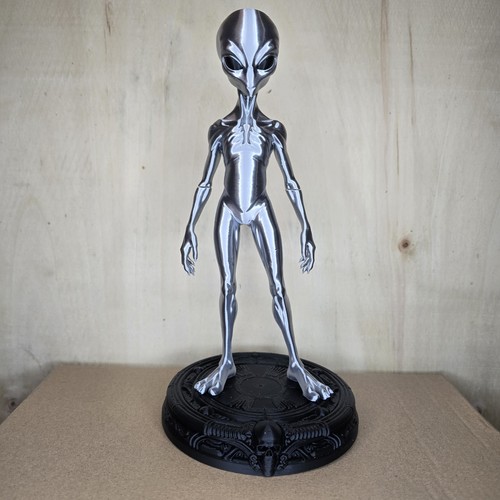 Silver grey alien figurine - silver,