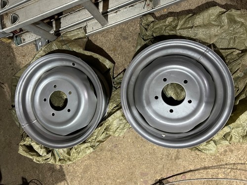 Pair front tractor wheel - of,
