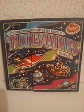   Tiddlywinks in space, never