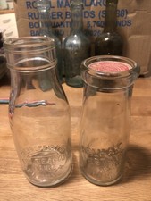 2x SMALL 1/2 PINT MILK BOTTLES KELHAM ESTATE NEWARK AND BEACON DAIRY PENRITH