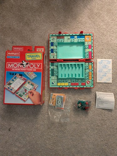 Travel monopoly red suitcase - travel,