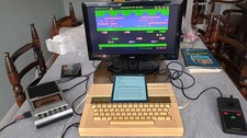 Acorn Electron Computer including Plus 1 and some accessories and games.
