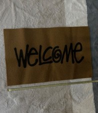Stussy mat "welcome" brown
