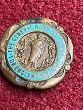 VINTAGE ENAMEL BADGE GENERAL