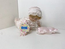 The Promenade Collection Porcelain Baby Doll with Pillow and Hat — Crawl Pose —