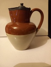 A  Brown And  Cream Pottery