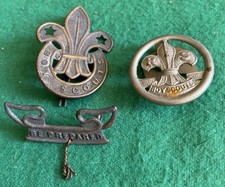 Boy Scout original cap badge with 'be prepared ' scroll & Rover Scout Cap Badge