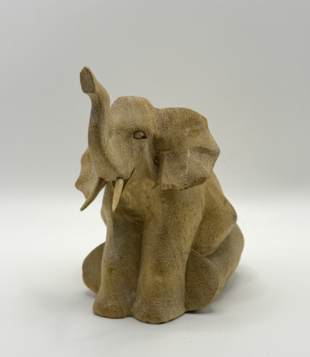 Hand carved wooden elephant - hand,