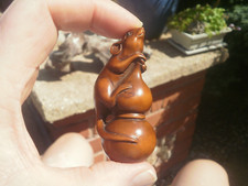 Hand Carved wood netsuke of a