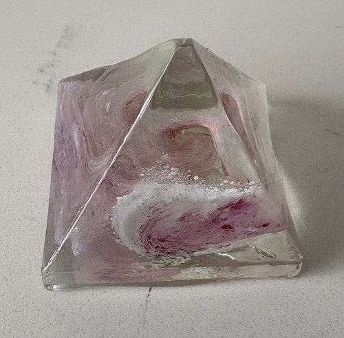 Pink pyramid paper weight - paper,