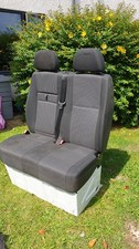 double front passenger seat from 2011 sprinter with base, with seat covers.