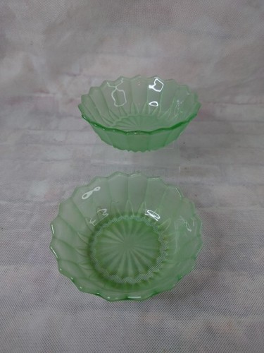 Pair green depression glass - of,
