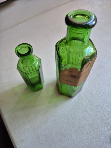 Vintage green glass bottles - vintage,