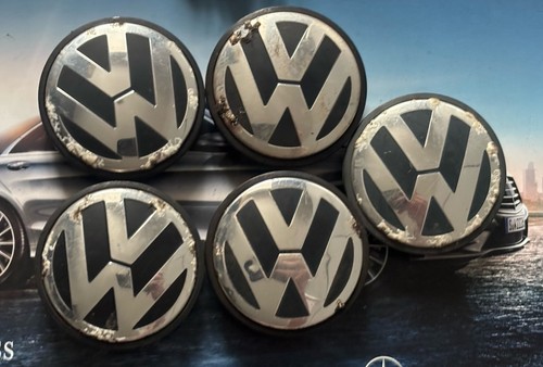 Five volkswagen wheel center - volkswagen,