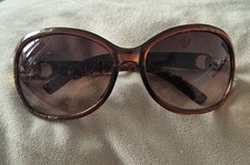 Foster Grant UV400 Lenses UVA/UVB Circle Pattern Brown Sunglasses Women’s 