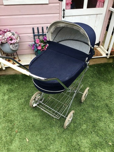 Retro vintage dolls pram baby
