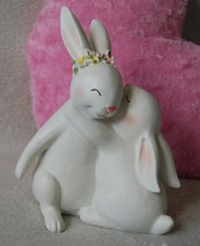 Cute Cuddling White Bunnies
