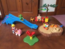 Playmobil children's playground set - dinosaur slide, sand pit, tree, etc