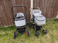 Mothercare Orb pram in grey and black.  Front and rear facing, reversible action