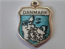 Silver travel shield charm