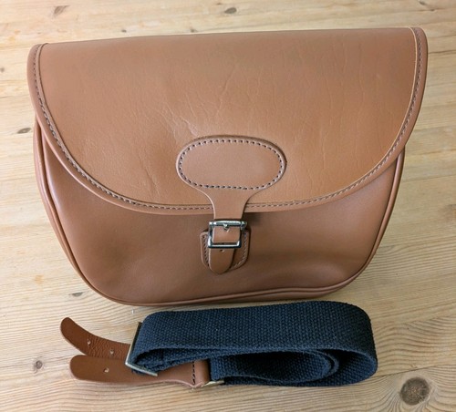 Brown shotgun cartridge bag - shotgun,