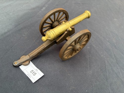 Vintage brass and iron cannon - and,