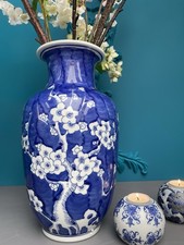 Cobalt Blue Porcelain Vase – White Plum Blossom Relief Motif, Tall Baluster Form
