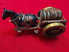 Melba Ware  ? Shire horse and barrel cart .