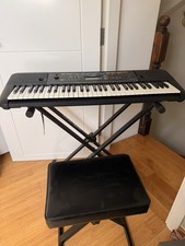 Yamaha E253 61-Key Electronic Piano Keyboard With Foldable Stand And Piano Stool