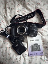 Used Canon EOS 1000D + EF-S 18-55mm Lens + Charger & Manual – Good Condition