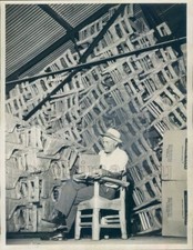 1958 Press Photo Man Sits by
